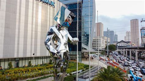artwork sm megamall|A Gigantic Time Statue Was Just Unveiled in Front of Megamall.